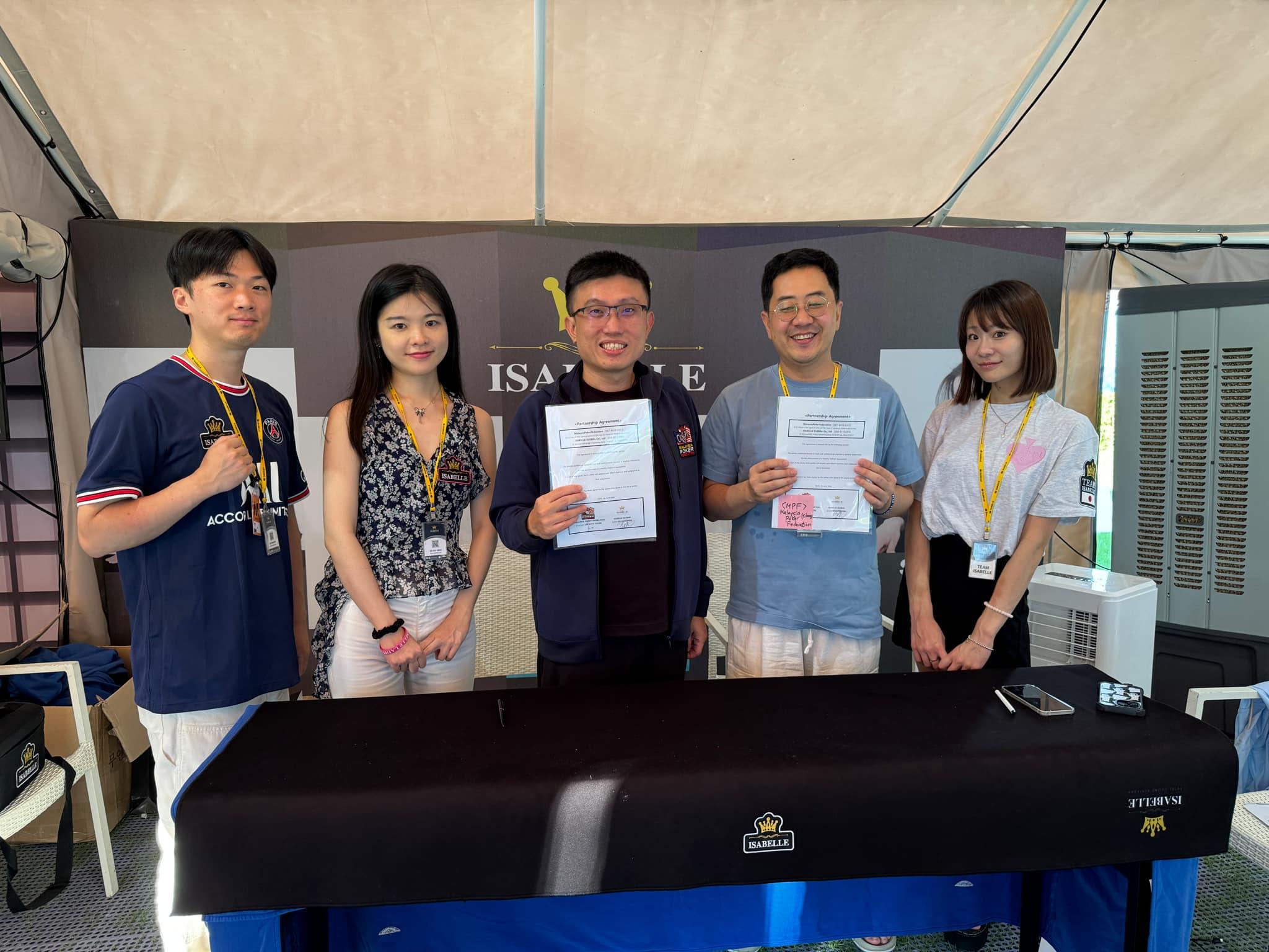 group smiling holding contract